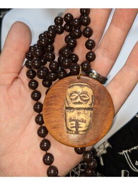 Hand-Carved Wooden Beaded Necklace With Tribal-Inspired Pendant